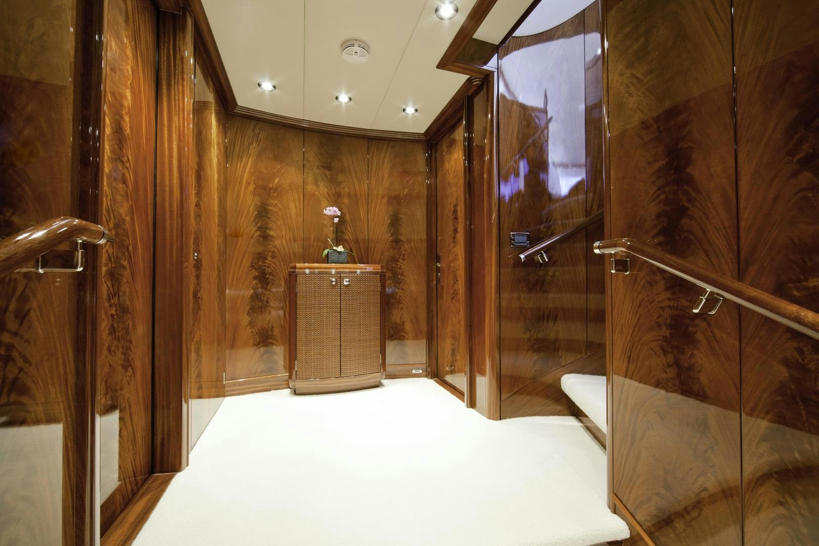 a bathroom with a glass shower aboard DESTINATION Yacht for Sale