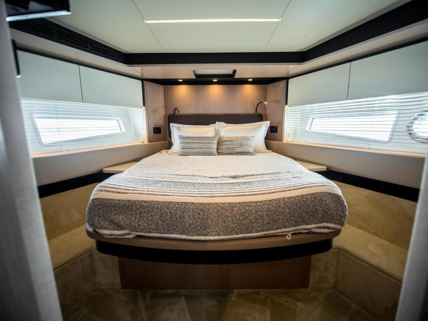 a bed in a room aboard EVADO Yacht for Sale