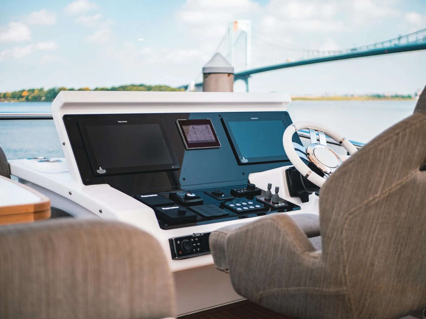 a person driving a boat aboard EVADO Yacht for Sale
