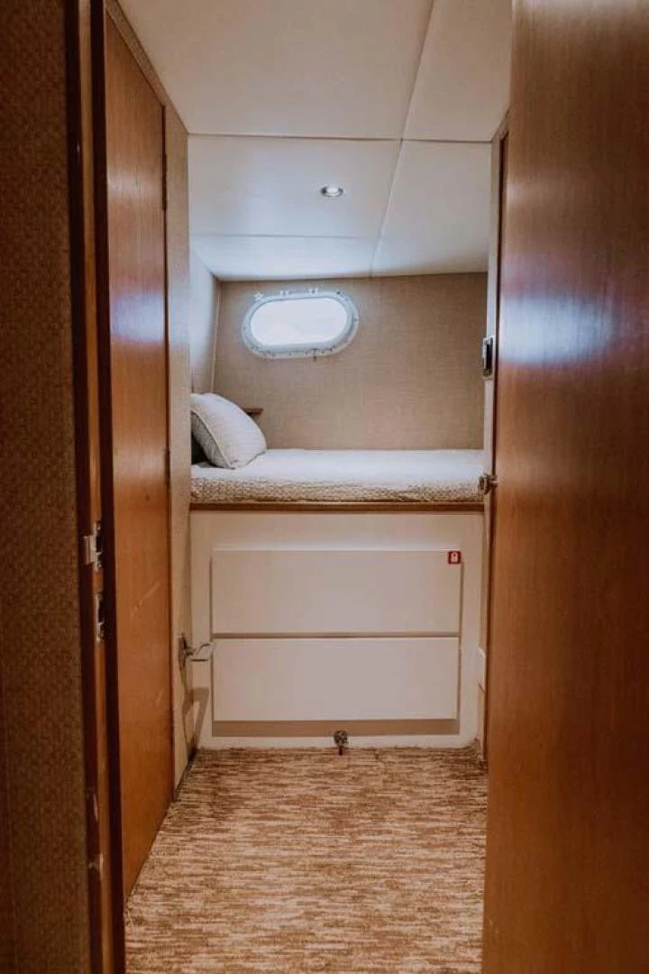 a small white bathroom aboard SUP Yacht for Sale