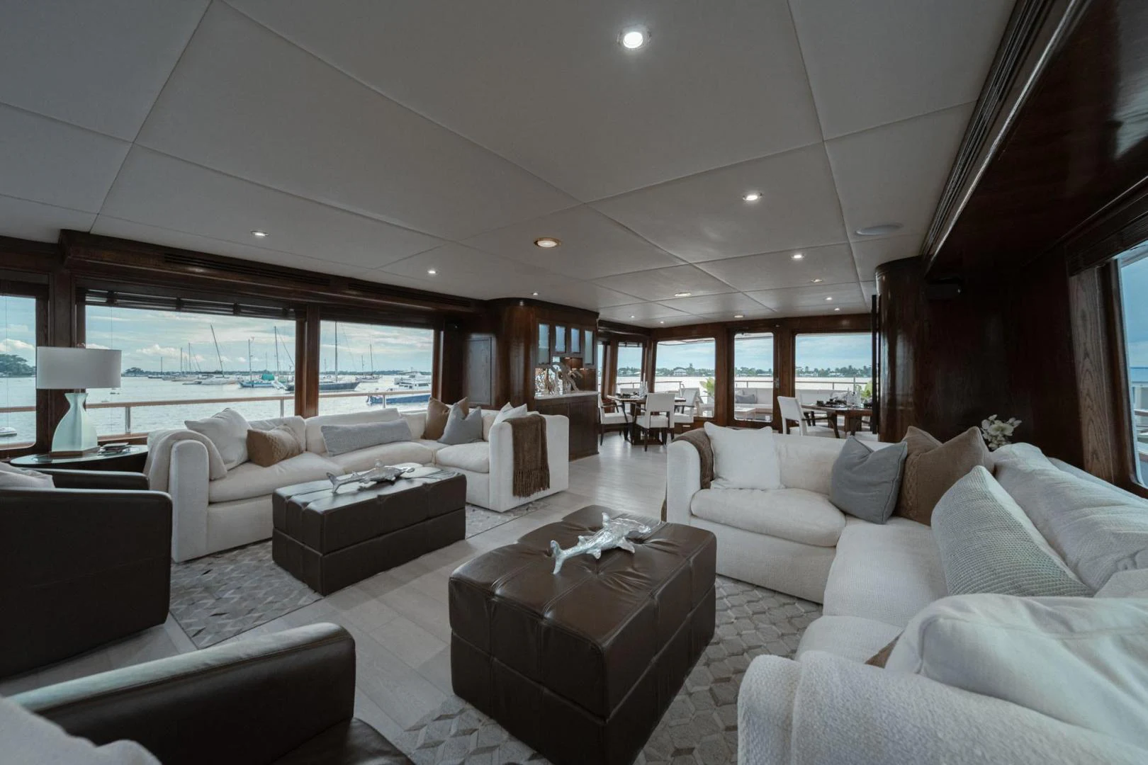 a living room with a large window aboard SUP Yacht for Sale