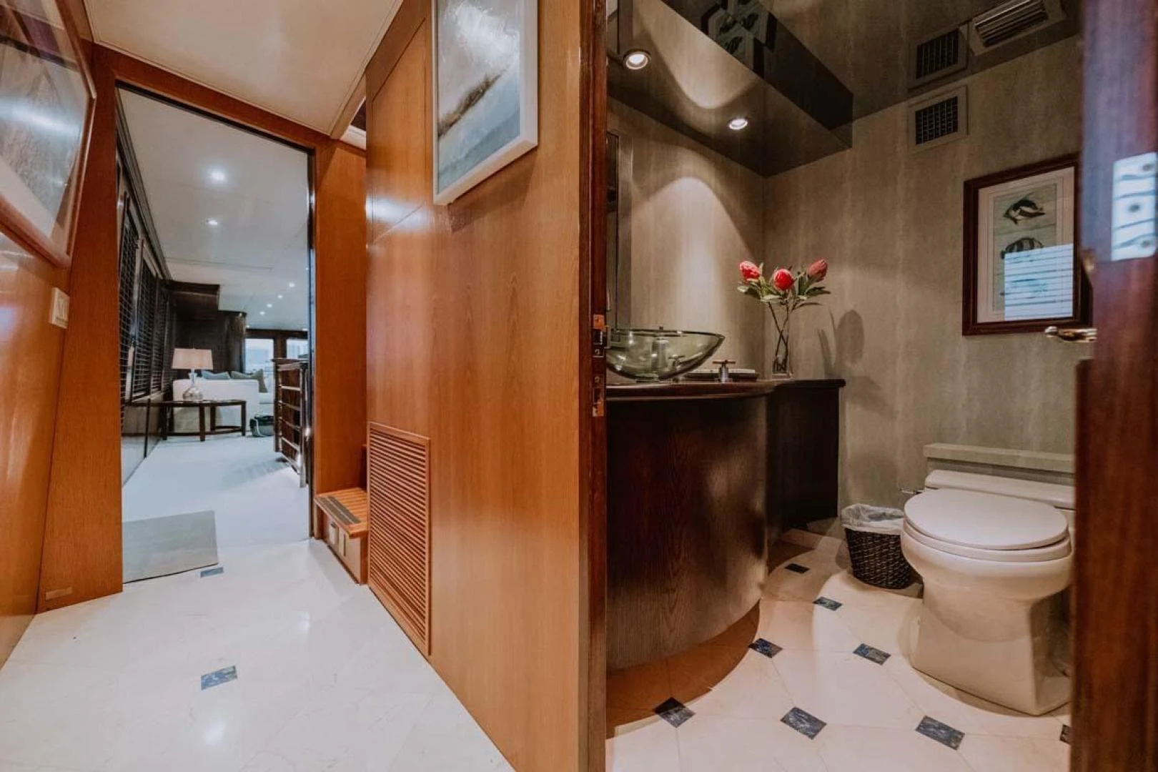 a bathroom with a toilet and a sink aboard SUP Yacht for Sale