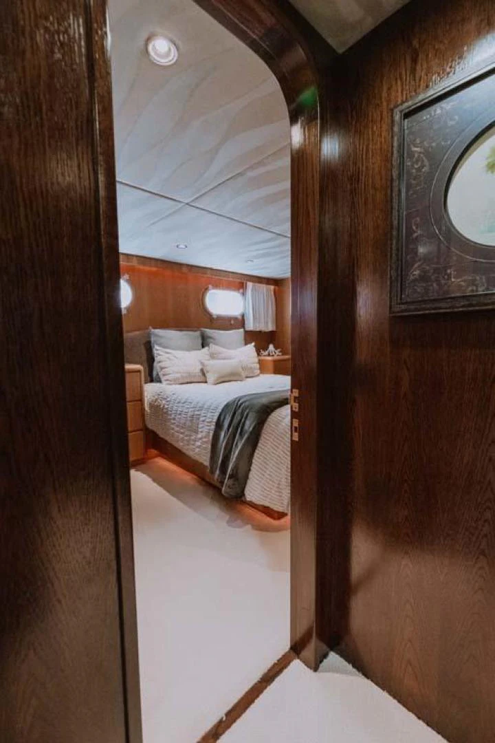 a bed in a room aboard SUP Yacht for Sale