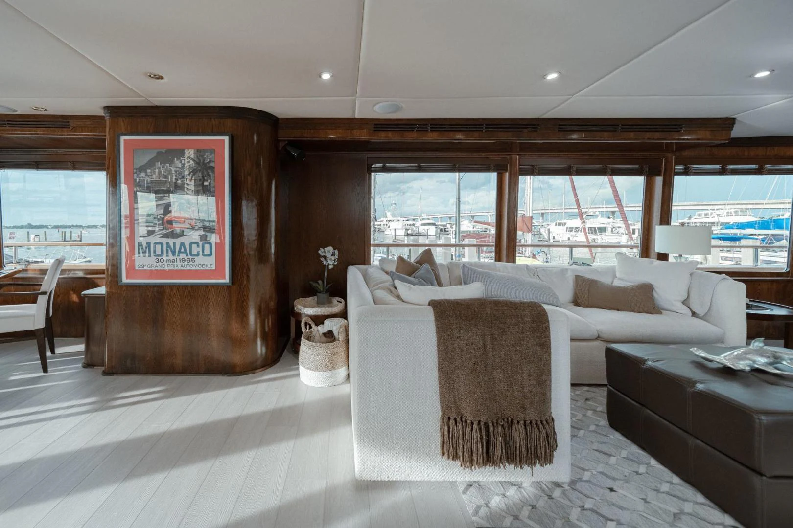 a room with a couch and a table and chairs aboard SUP Yacht for Sale