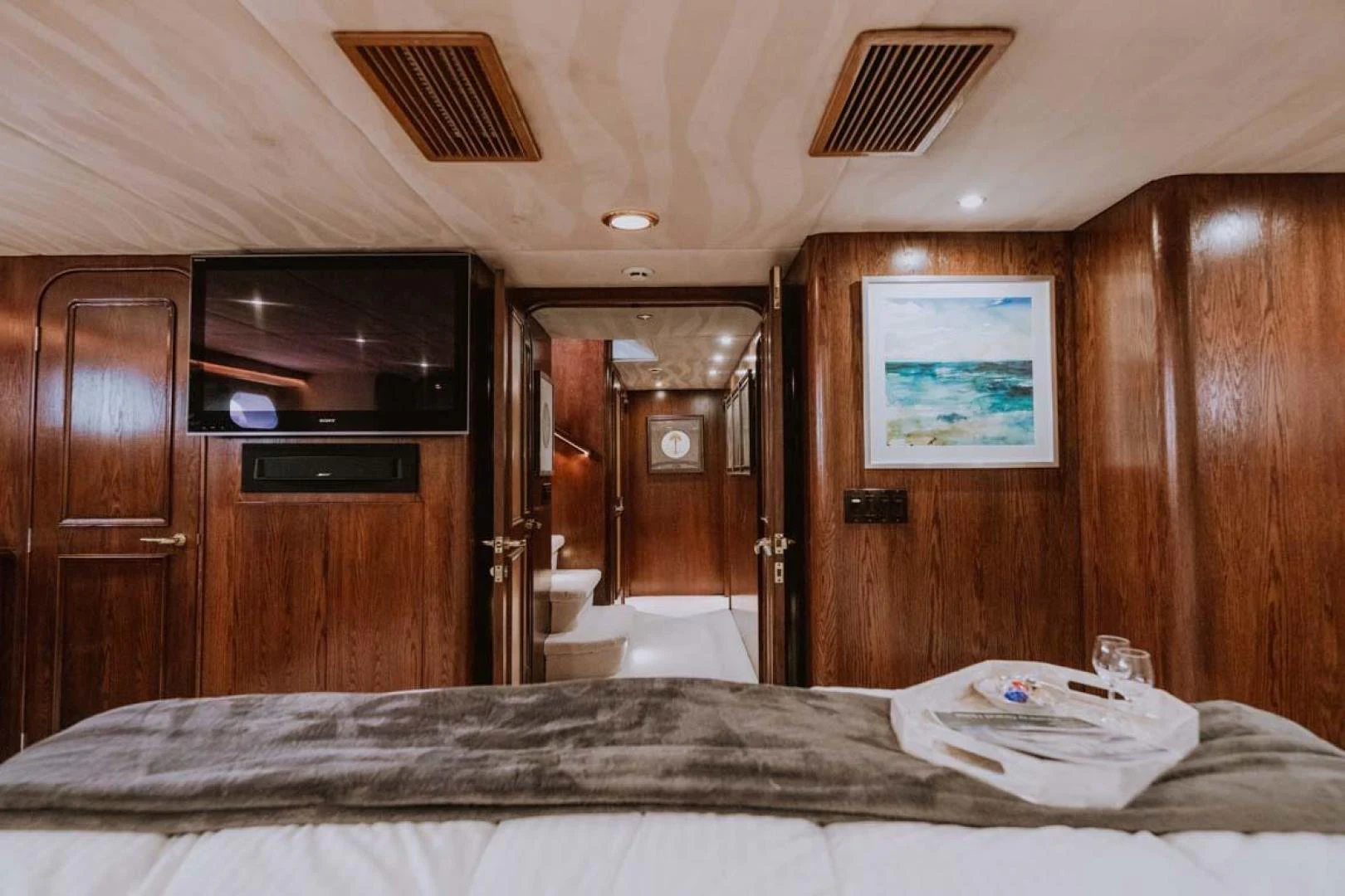 a bed in a room aboard SUP Yacht for Sale