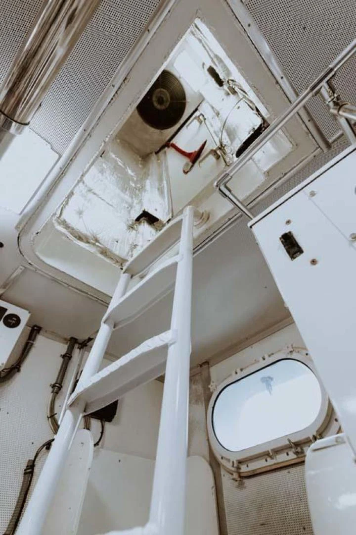 a toilet with pipes aboard SUP Yacht for Sale