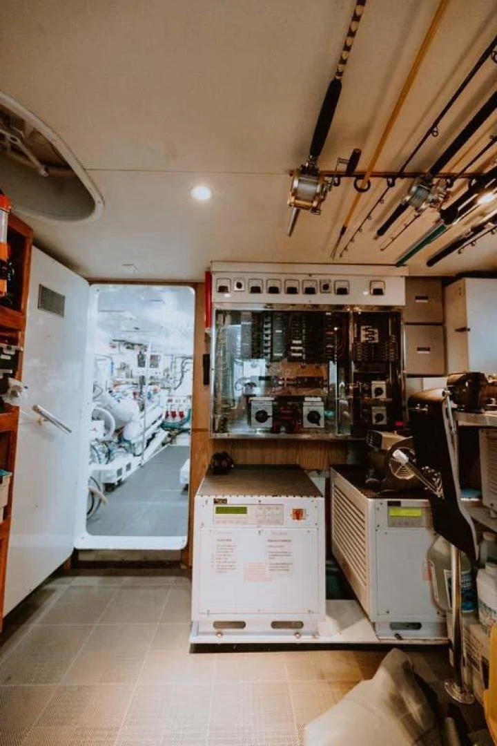 a room with machines and equipment aboard SUP Yacht for Sale