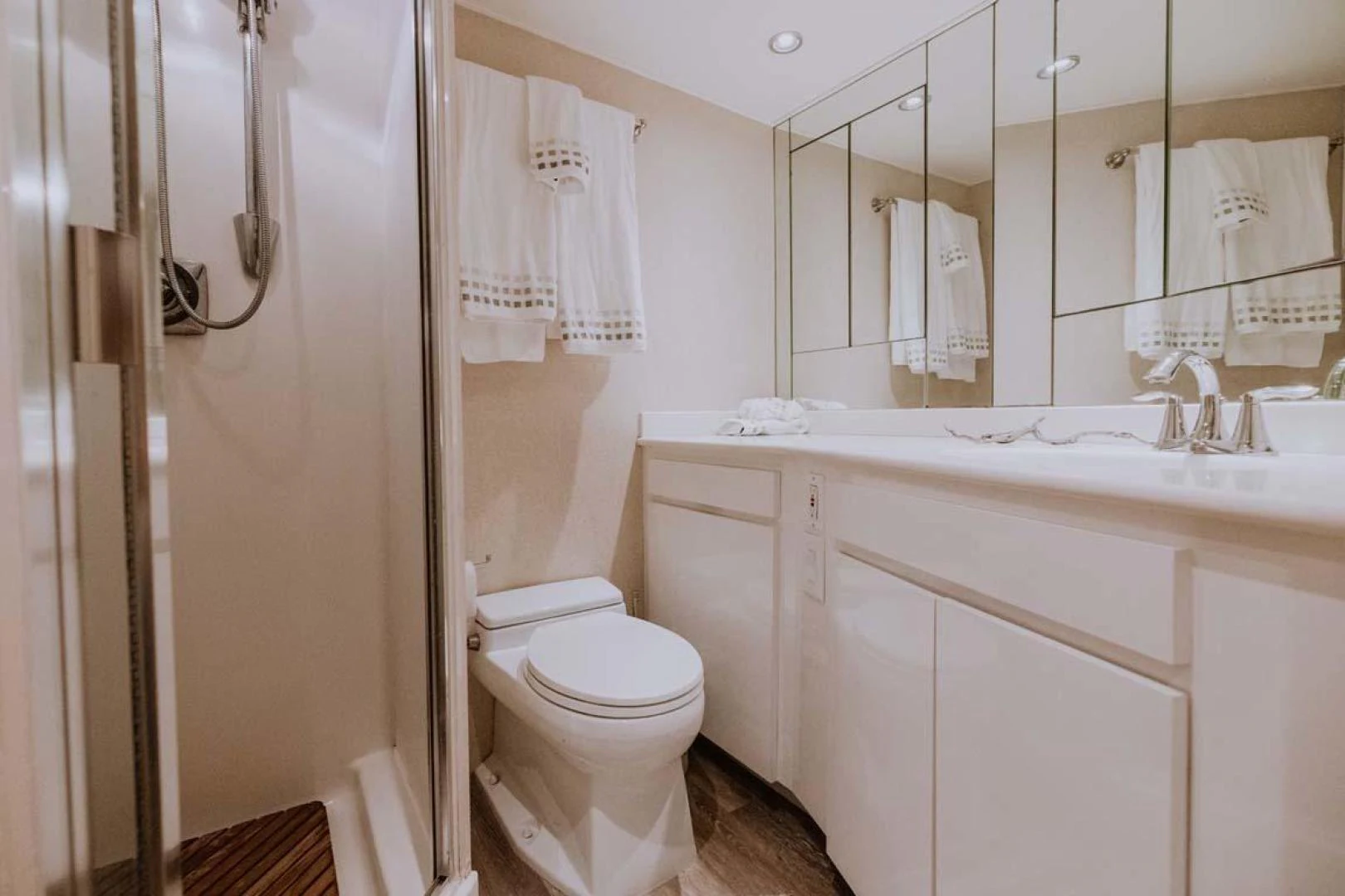 a bathroom with a sink toilet and a bathtub aboard SUP Yacht for Sale