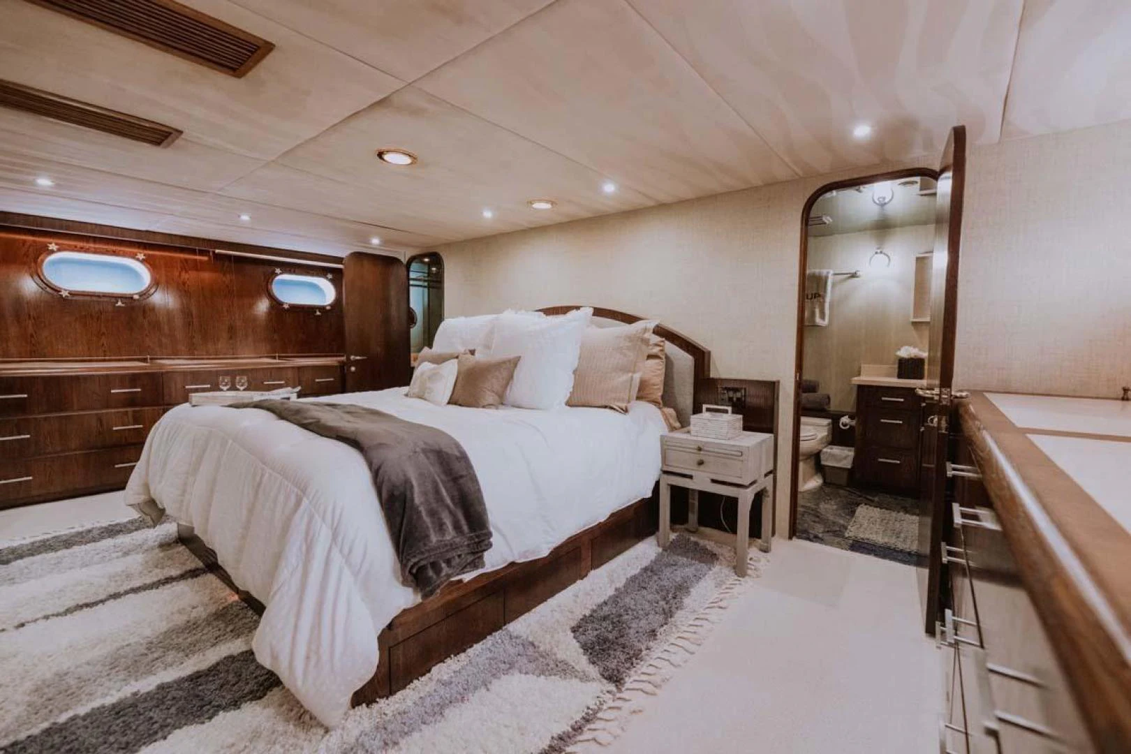 a bedroom with a large bed aboard SUP Yacht for Sale