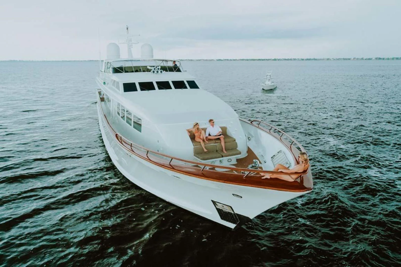 a couple on a boat aboard SUP Yacht for Sale