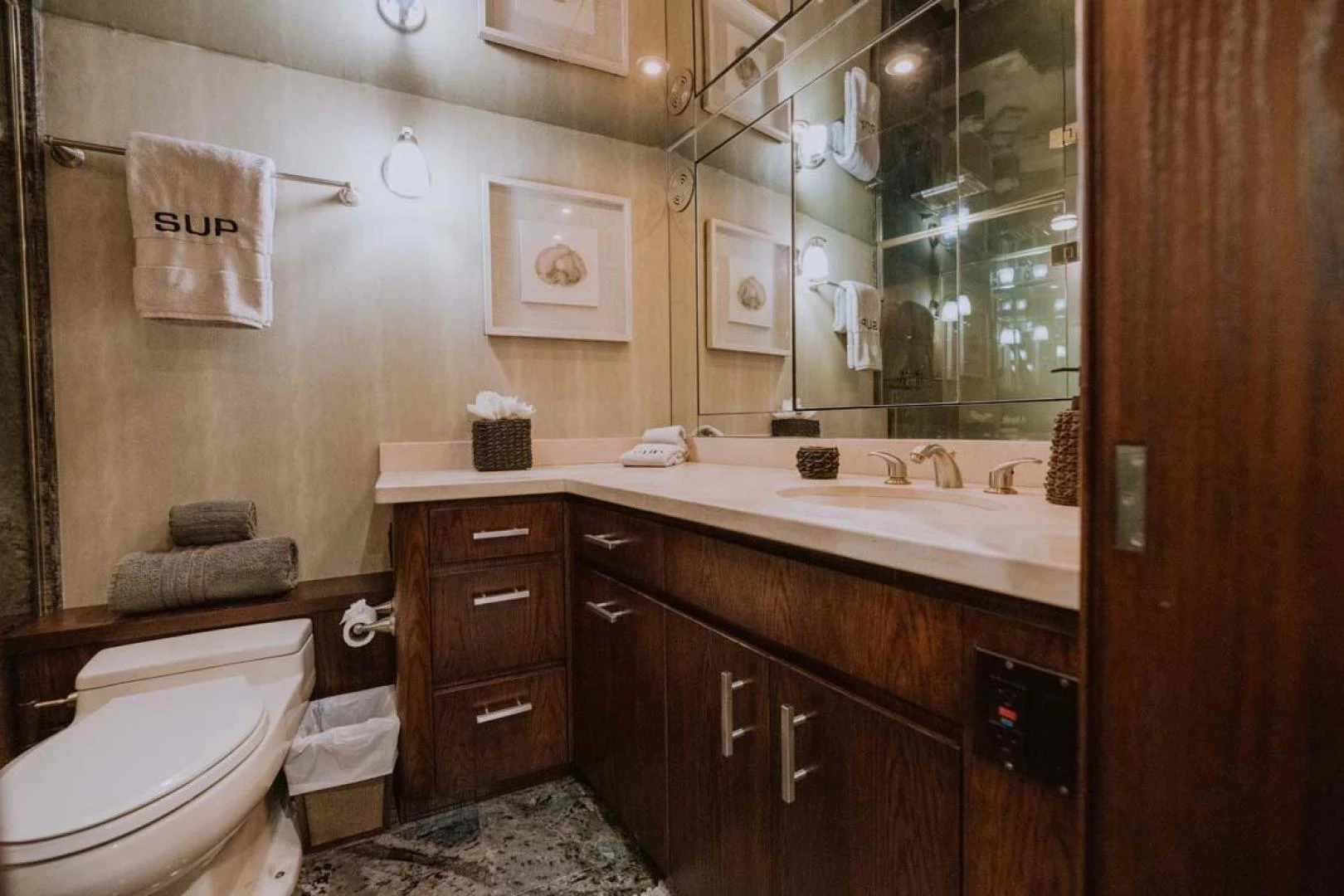 a bathroom with a sink and toilet aboard SUP Yacht for Sale