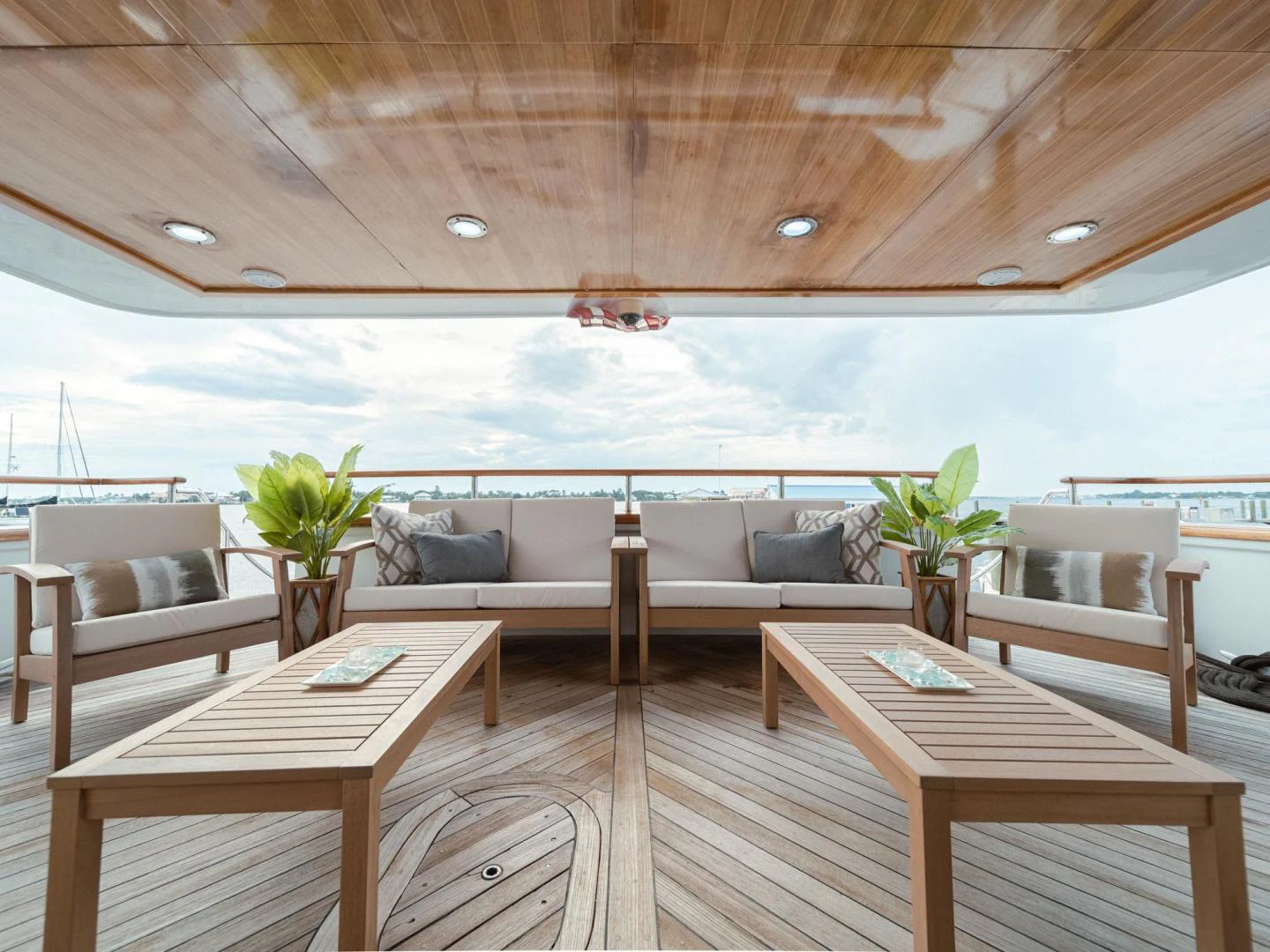 a living room with a large body of water aboard SUP Yacht for Sale