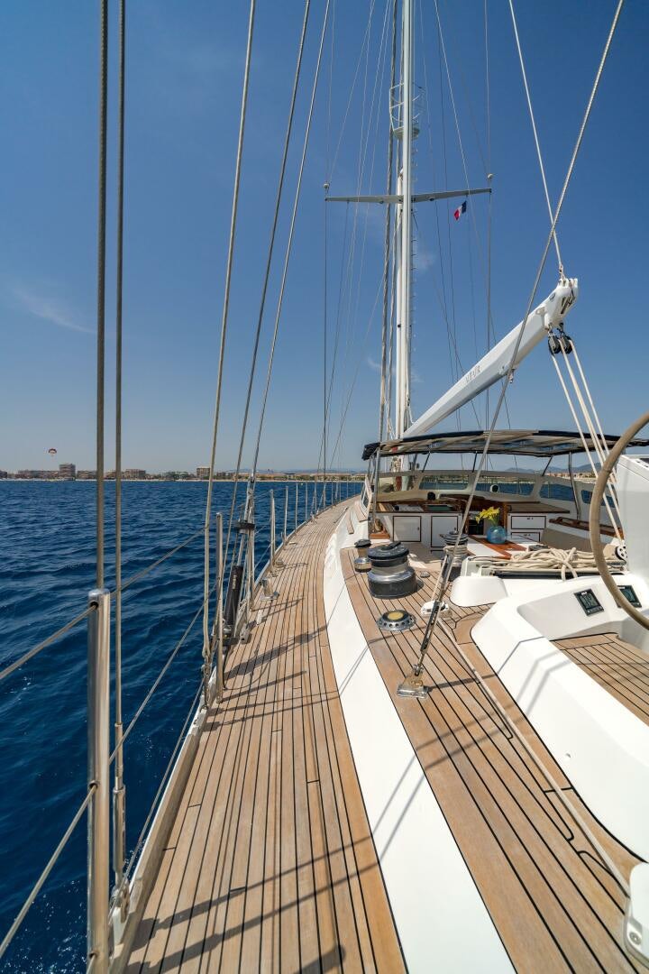 a deck with a boat on it aboard ALTAIR Yacht for Sale