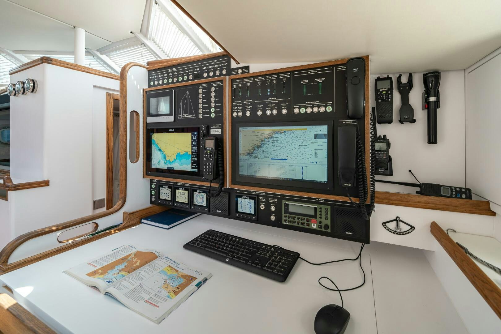 a computer on a desk aboard ALTAIR Yacht for Sale