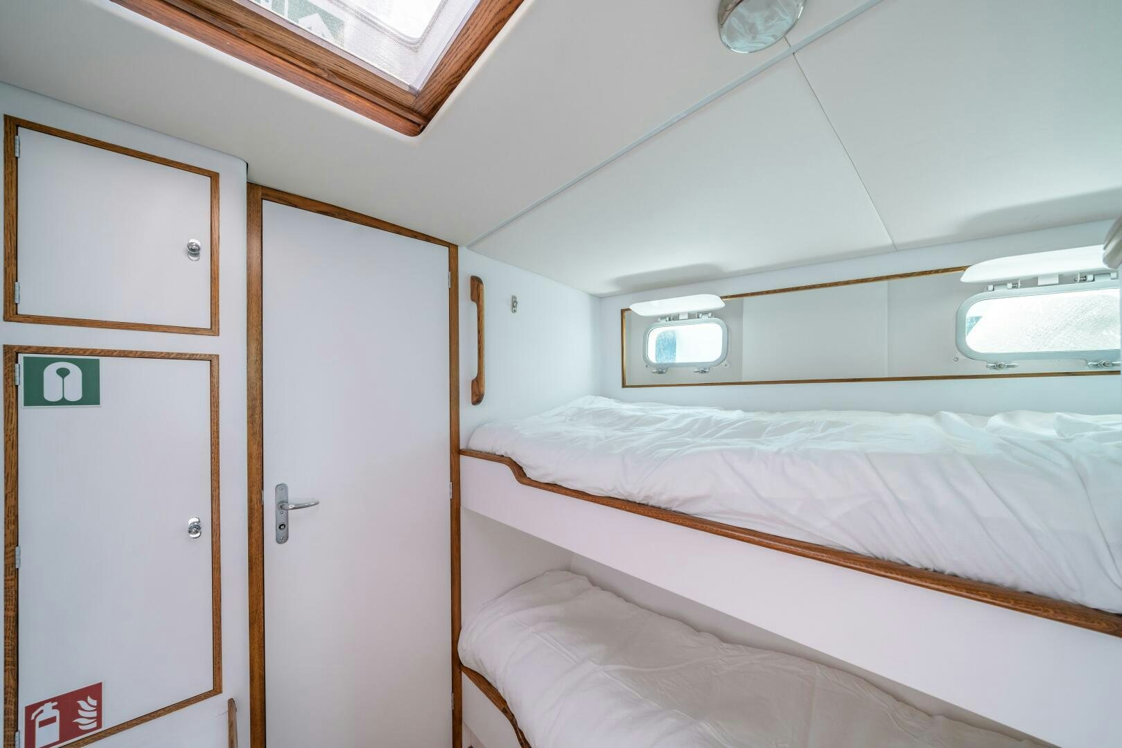 a room with two beds aboard ALTAIR Yacht for Sale