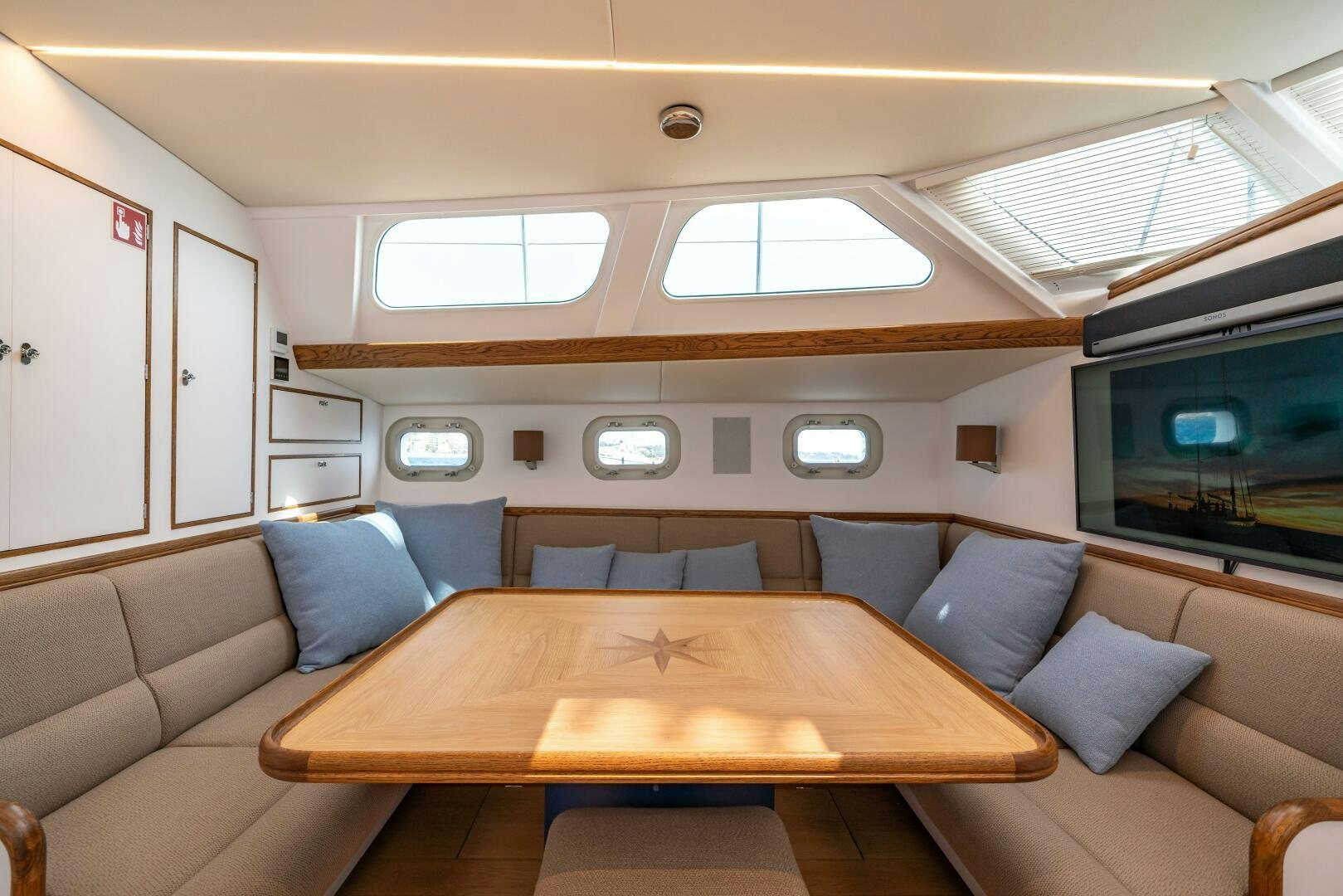 a room with a couch and a table aboard ALTAIR Yacht for Sale