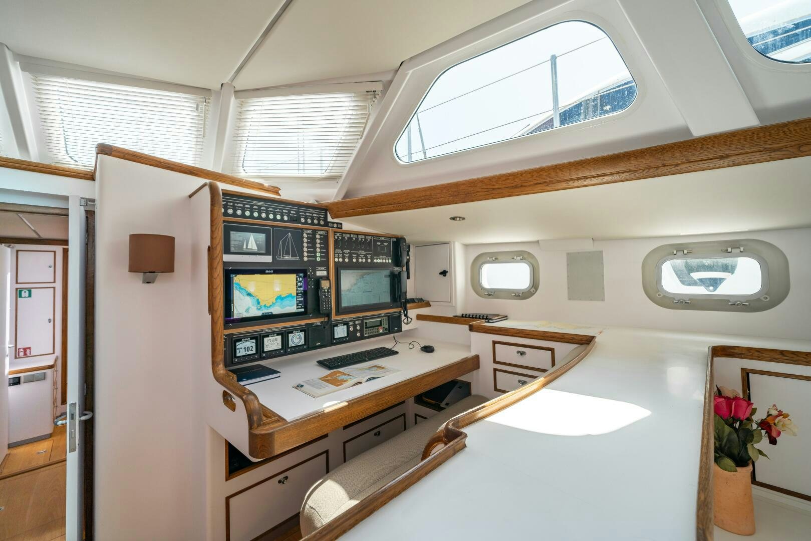a room with a desk and a television aboard ALTAIR Yacht for Sale
