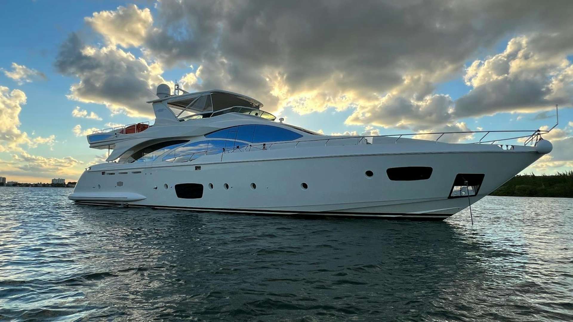 a white yacht on the water aboard BT 2 Yacht for Sale