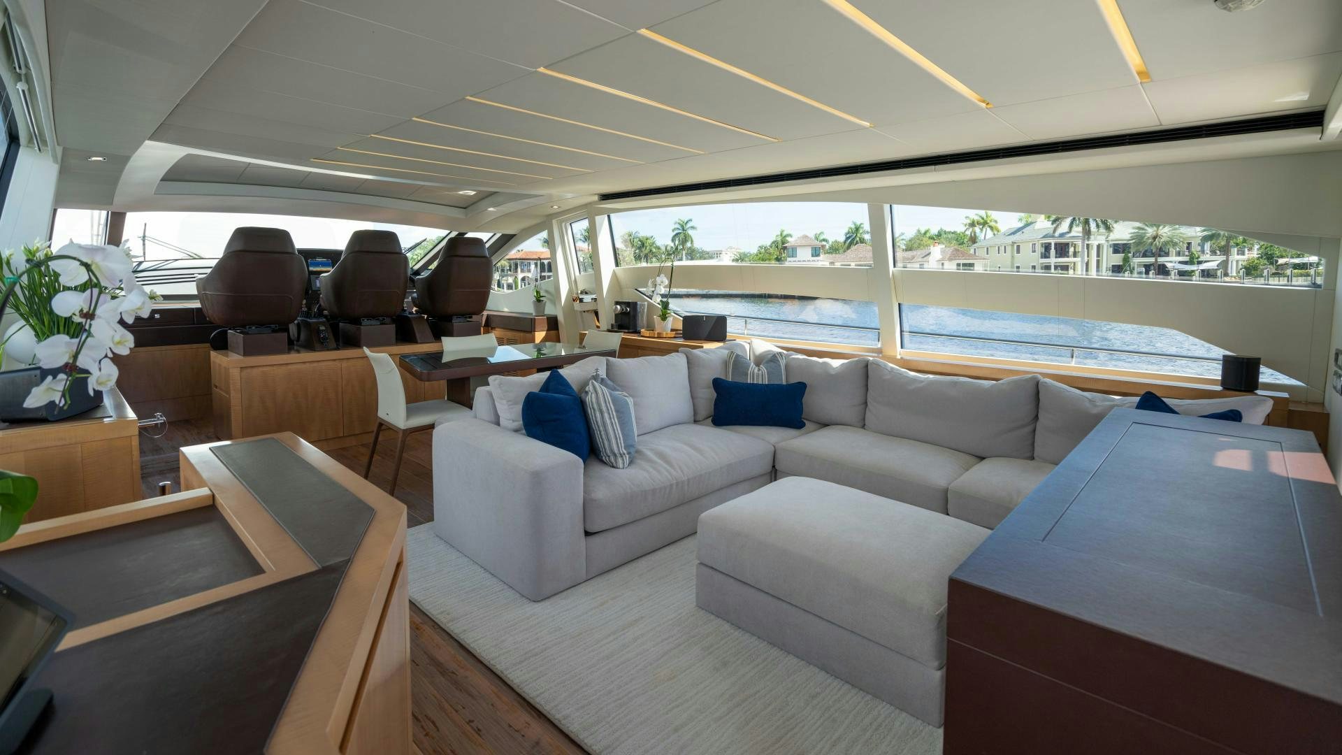 a room with a couch and a table aboard VIXEN Yacht for Sale