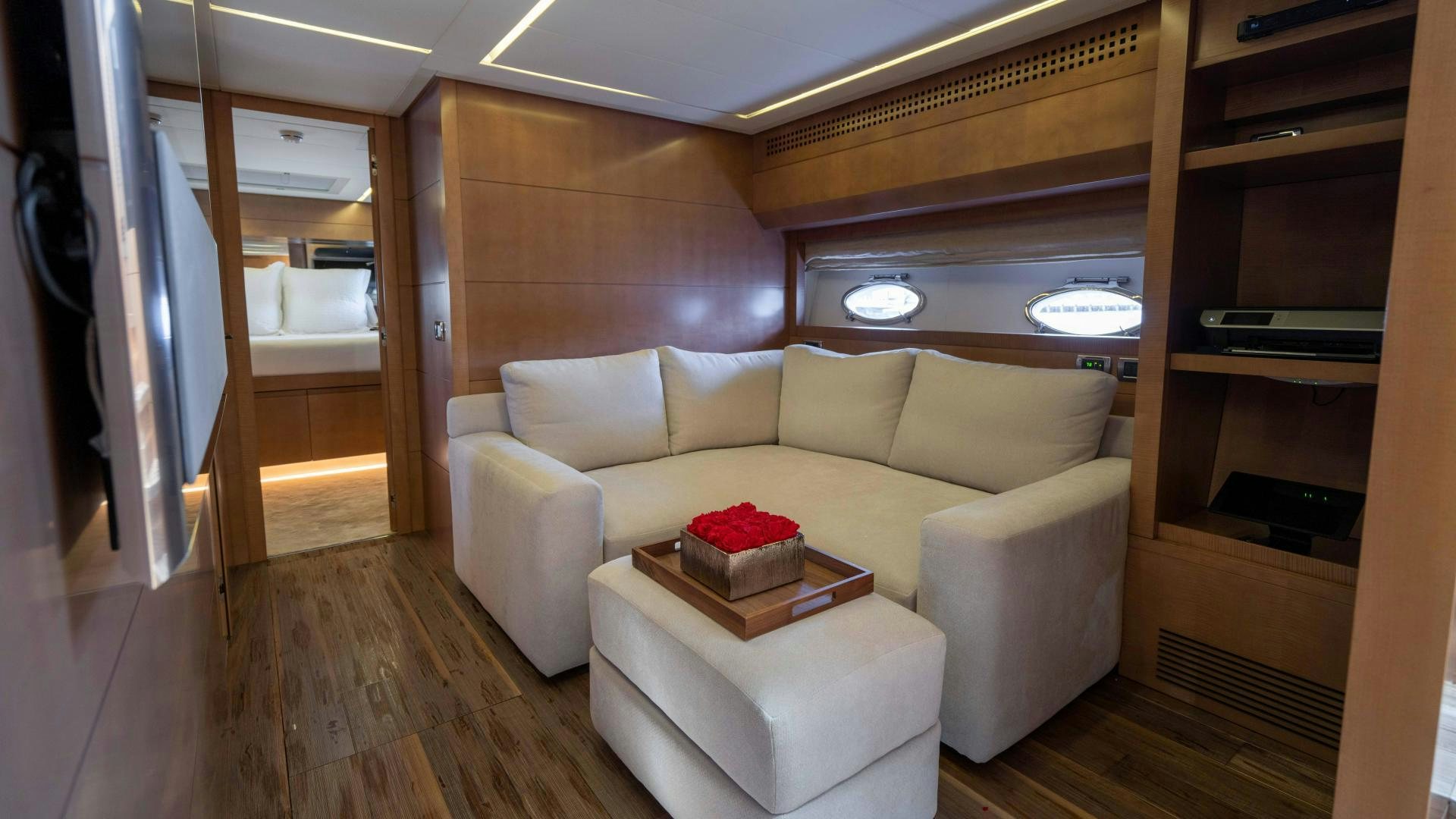 a living room with a couch and a table aboard VIXEN Yacht for Sale