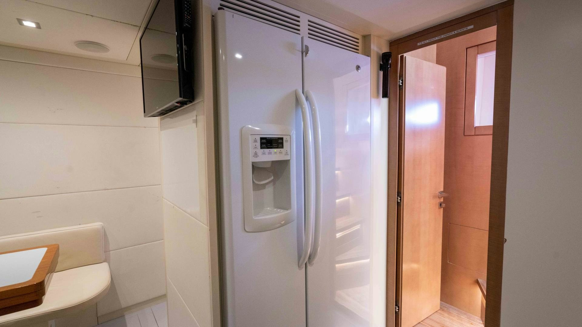 a room with a large machine aboard VIXEN Yacht for Sale