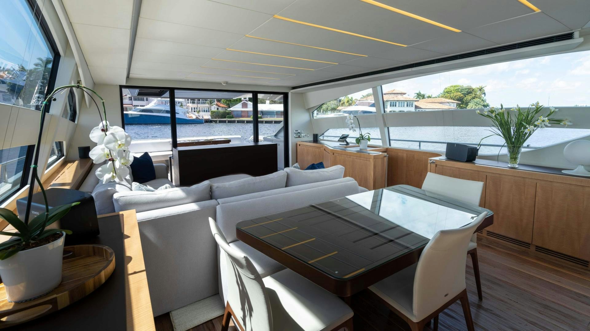 a room with a table and chairs aboard VIXEN Yacht for Sale