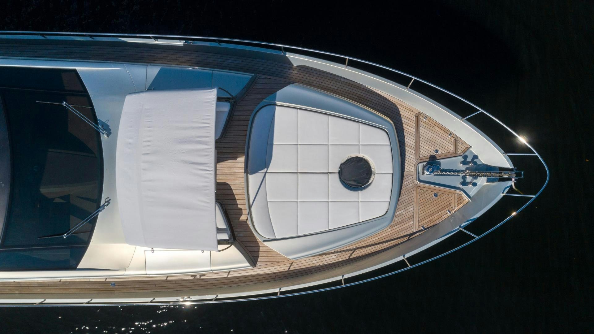 a person holding a book aboard VIXEN Yacht for Sale
