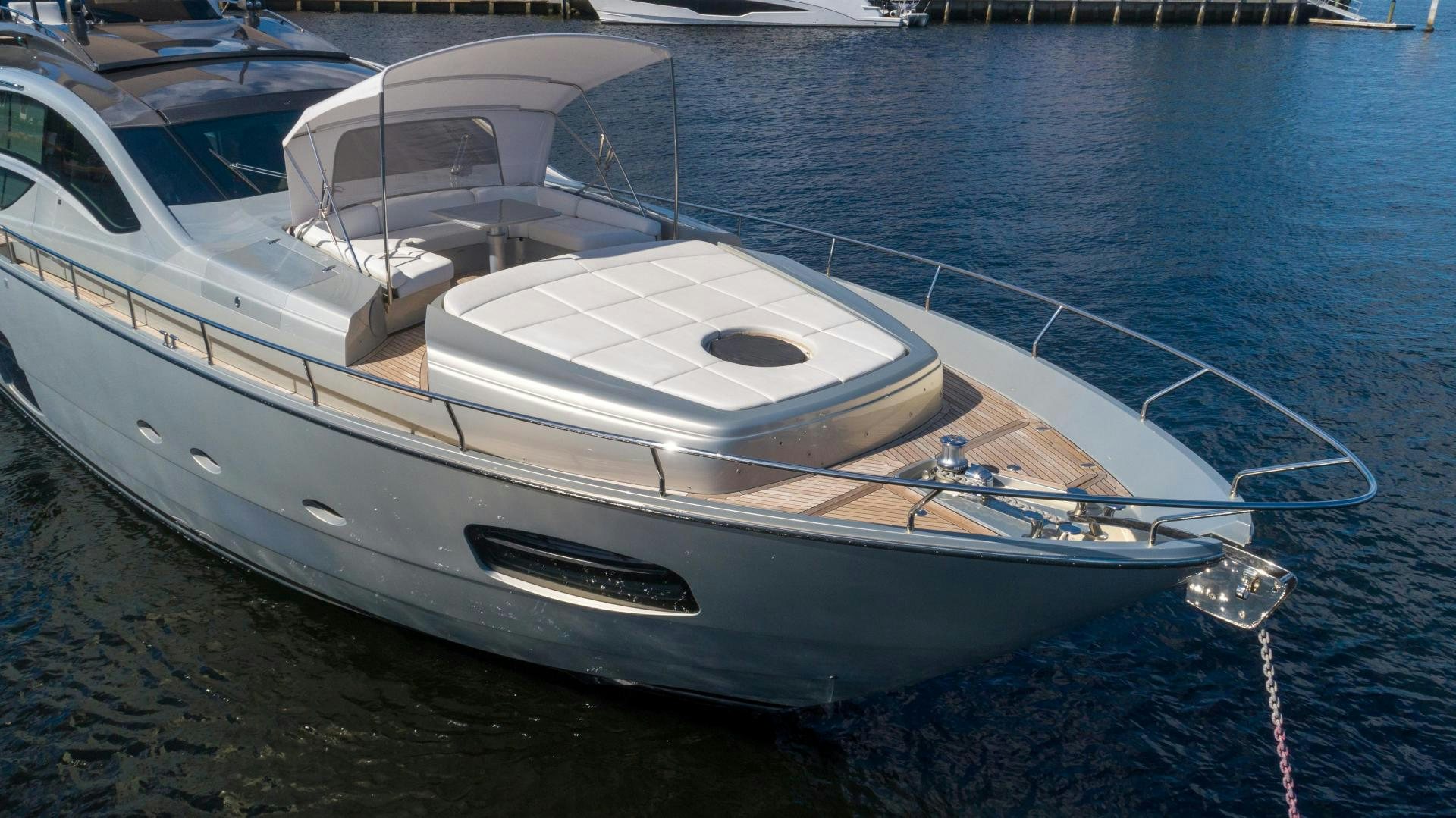 a white boat on the water aboard VIXEN Yacht for Sale