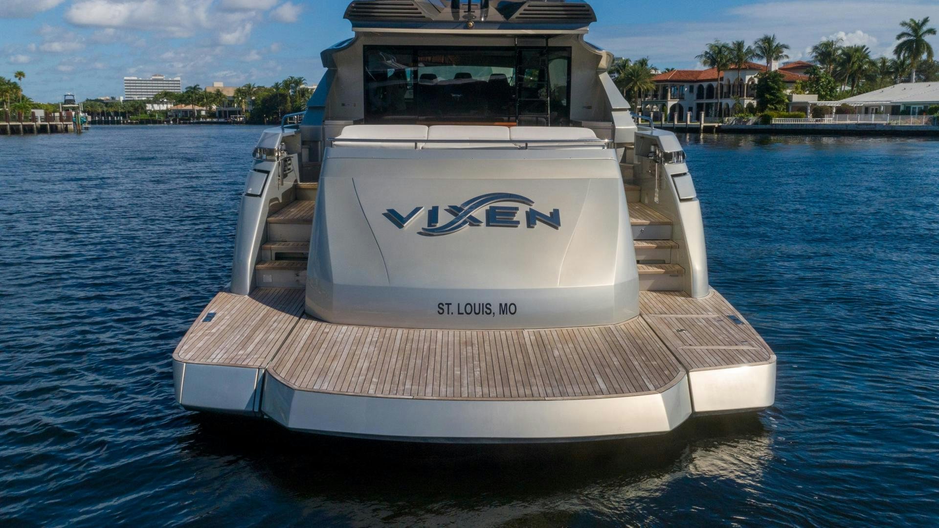 a white boat in the water aboard VIXEN Yacht for Sale