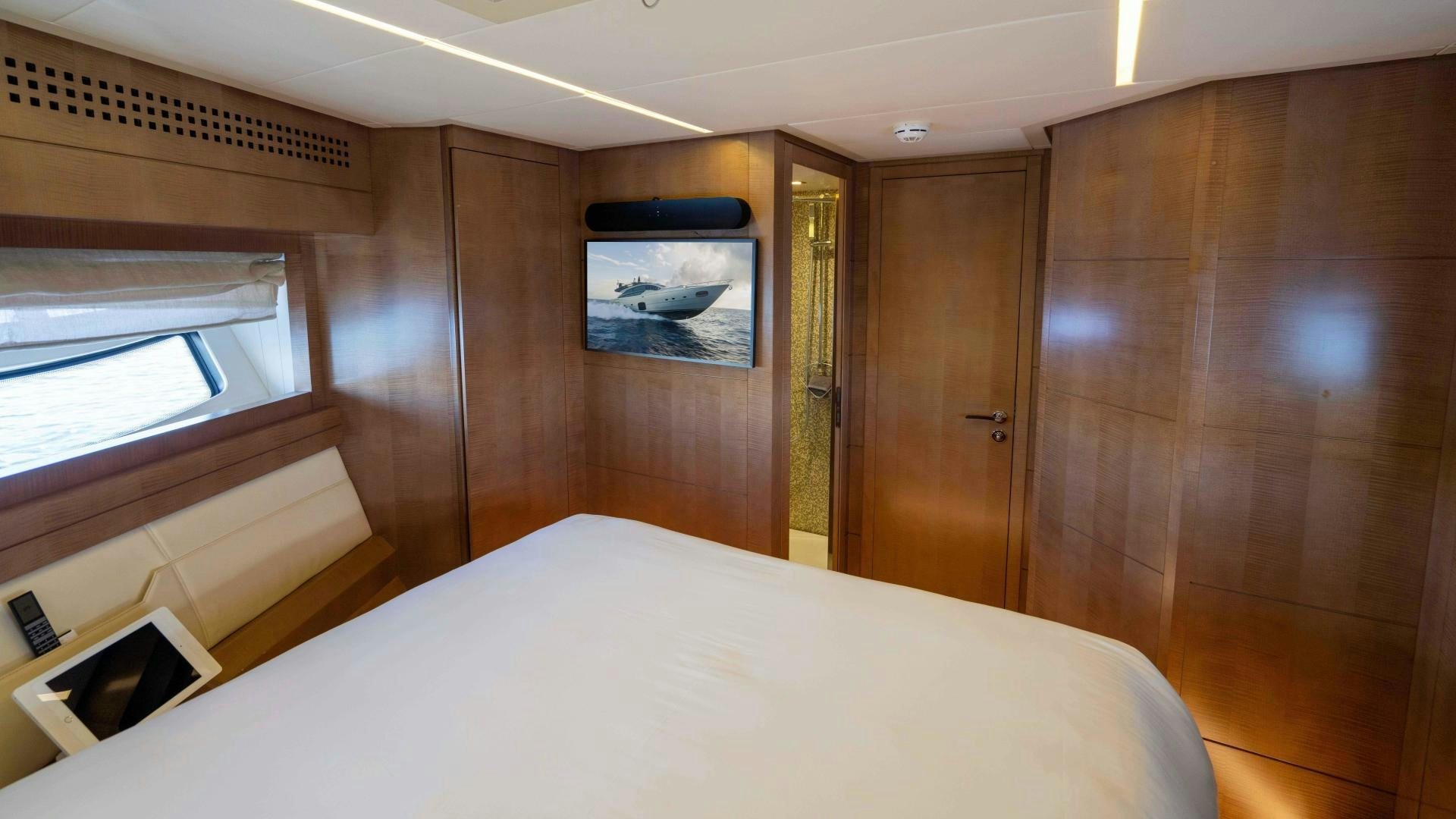 a bed in a room aboard VIXEN Yacht for Sale