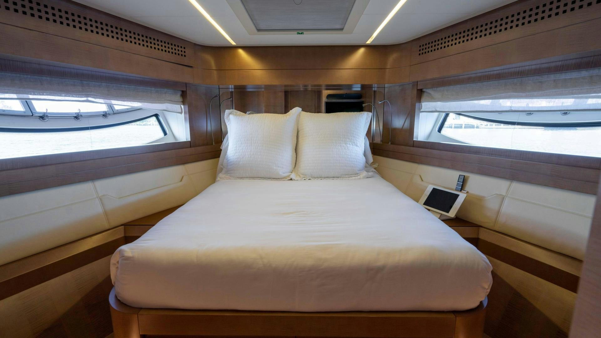 a bed in a room aboard VIXEN Yacht for Sale