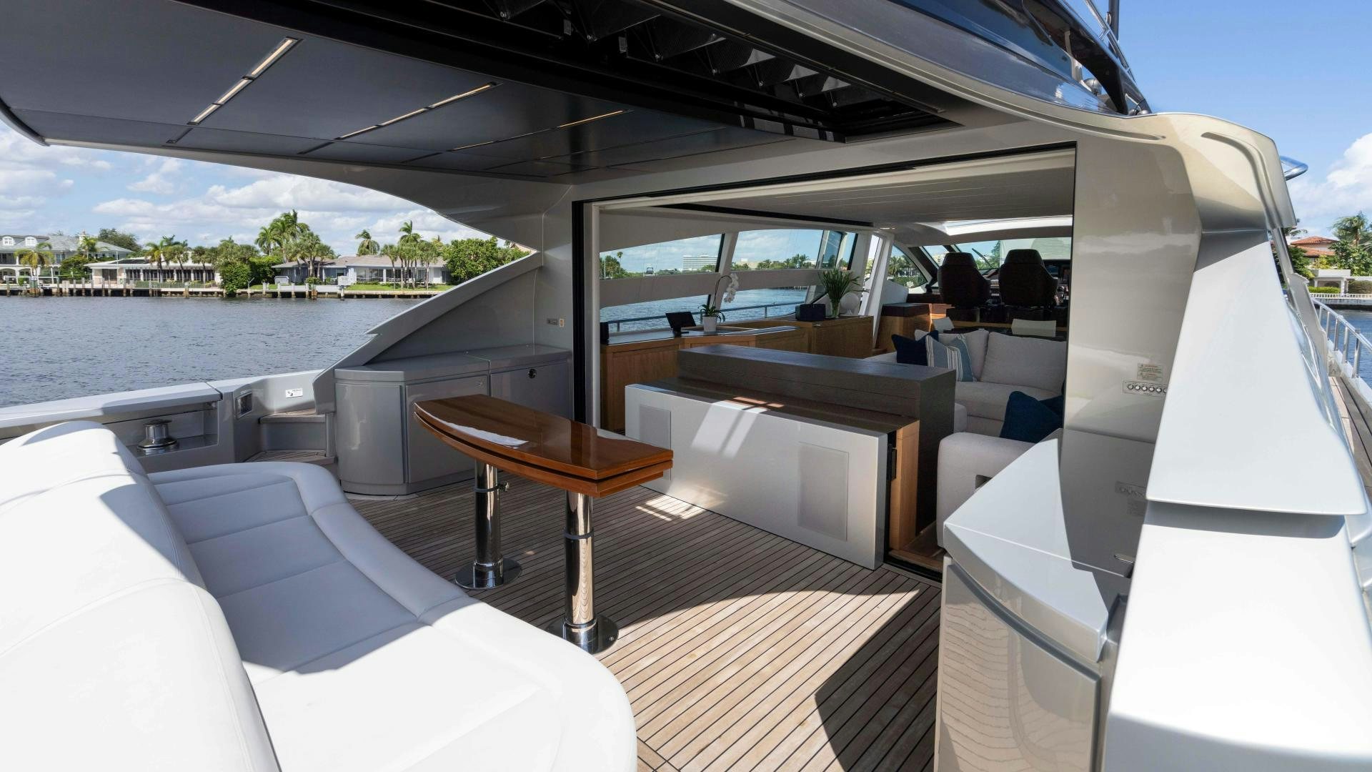 a boat with a table and chairs aboard VIXEN Yacht for Sale