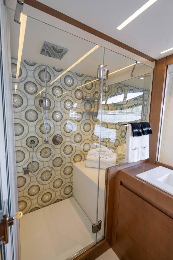a bathroom with a shower unit aboard VIXEN Yacht for Sale