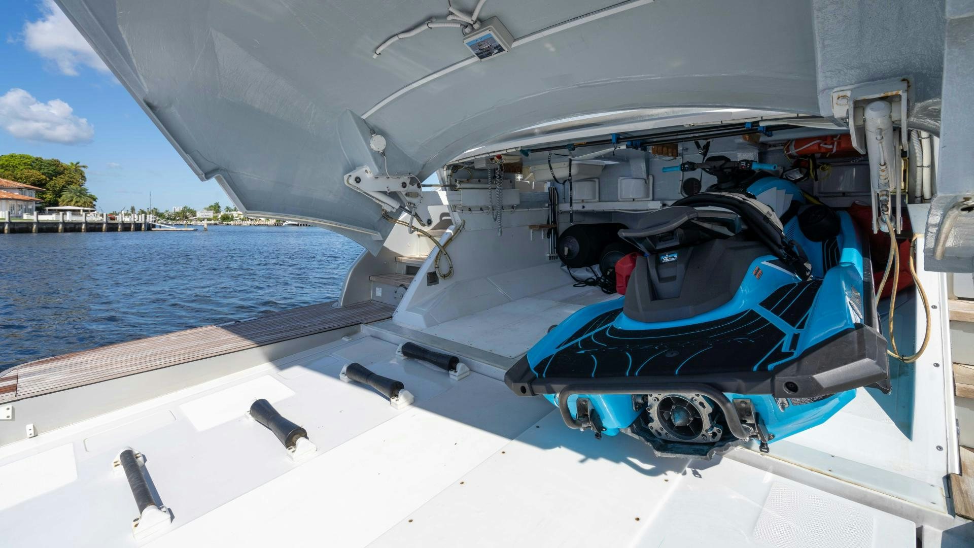 a boat with a blue cover and a blue sky aboard VIXEN Yacht for Sale