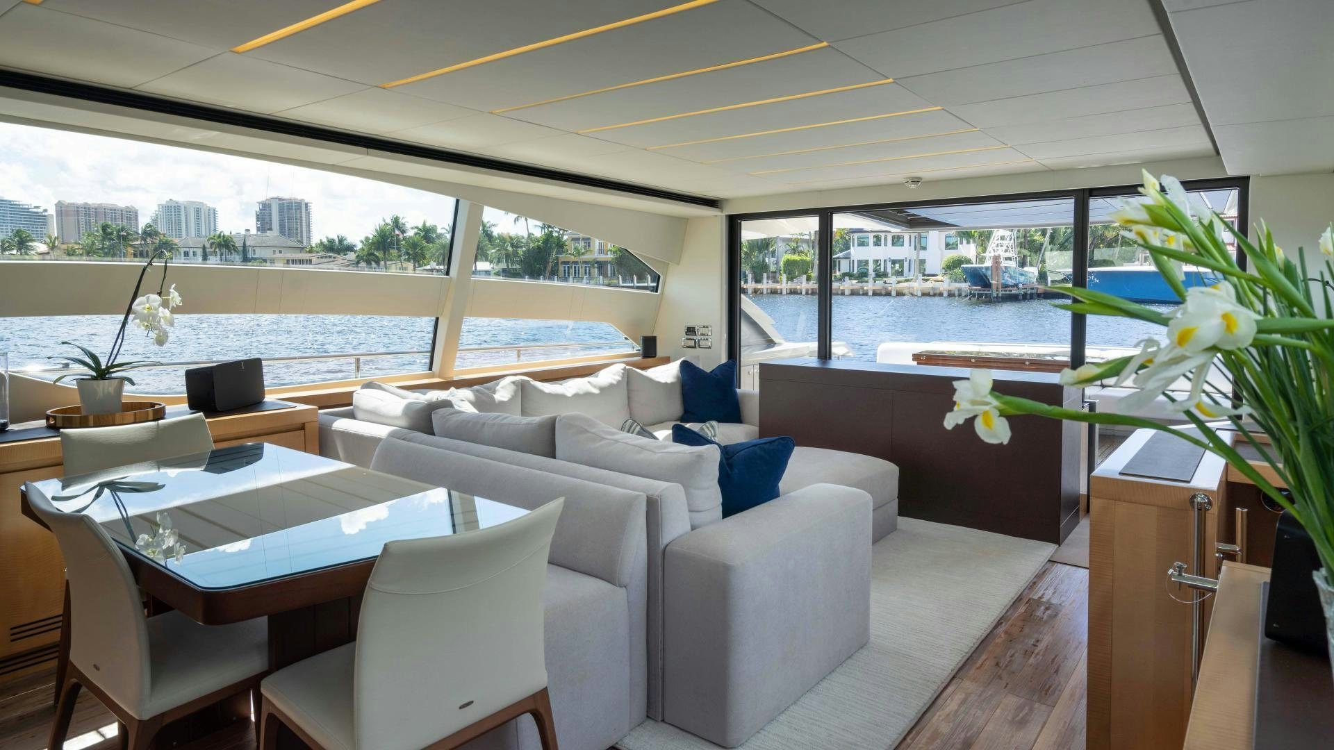 a room with a table and chairs aboard VIXEN Yacht for Sale