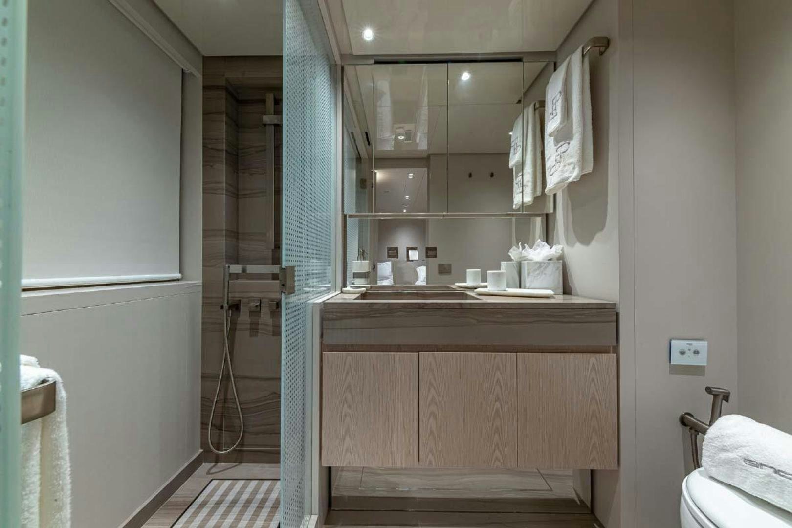 a bathroom with a sink and a mirror aboard ANOTHER ONE Yacht for Sale