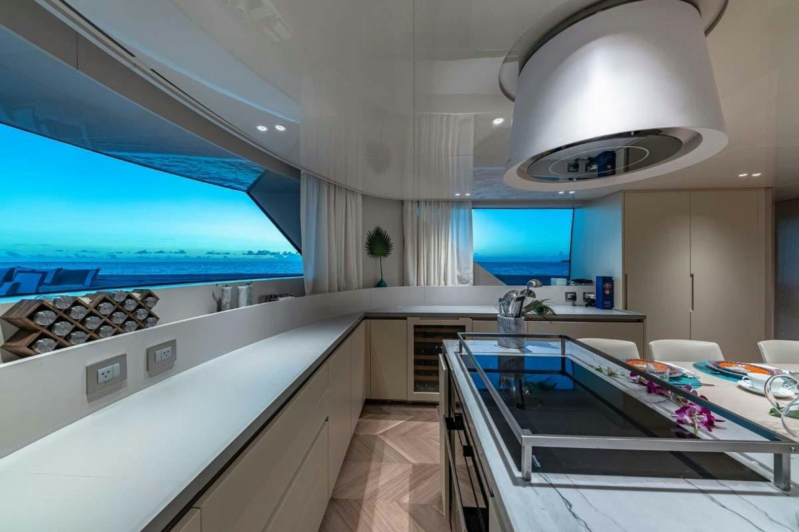 a kitchen with a large island aboard ANOTHER ONE Yacht for Sale