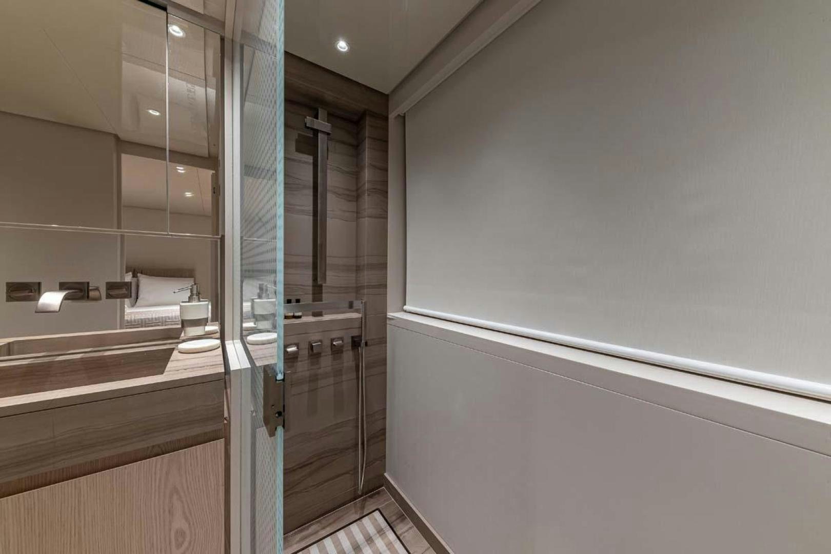 a room with a closet and a mirror aboard ANOTHER ONE Yacht for Sale