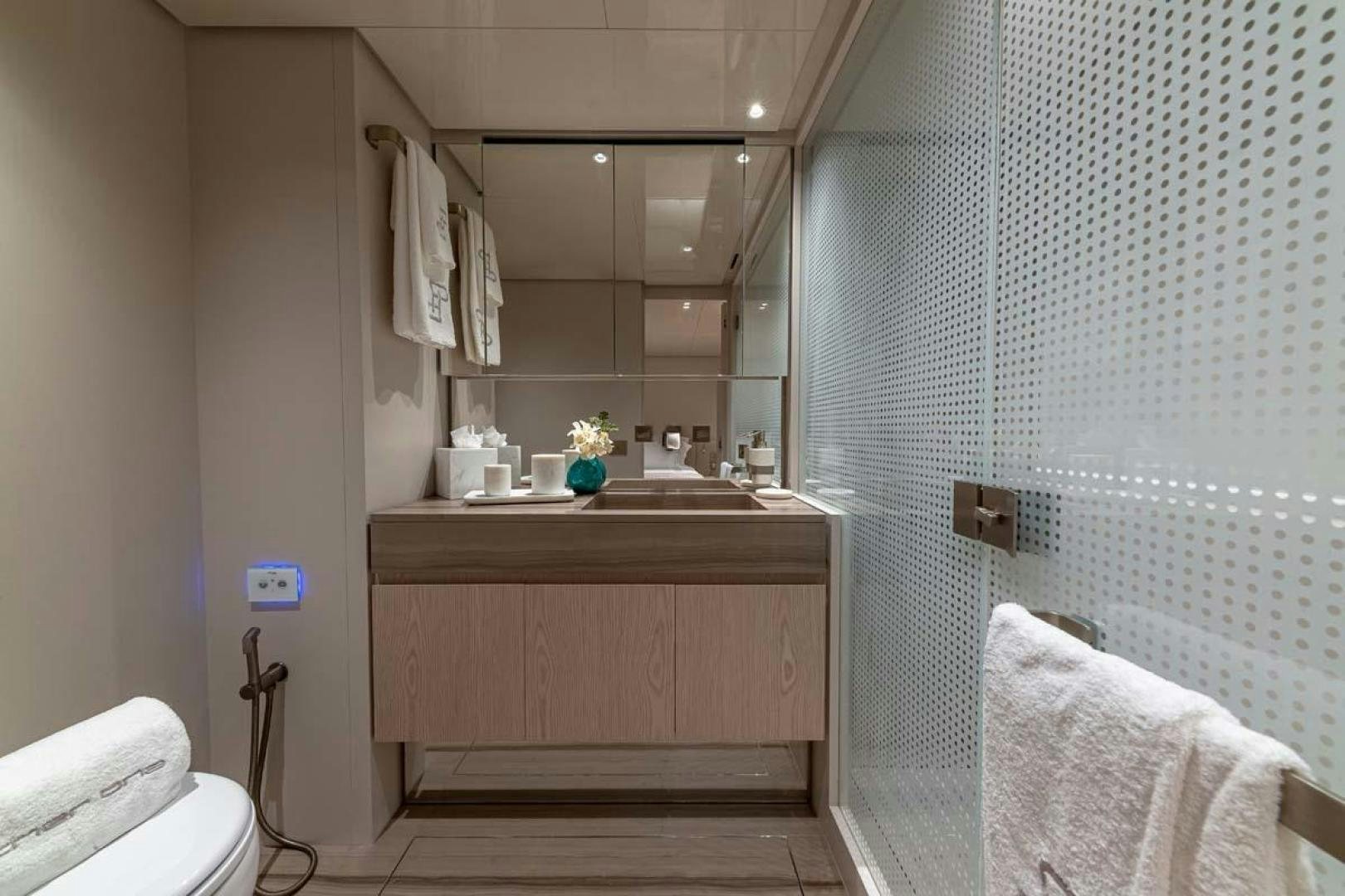 a bathroom with a sink and a shower aboard ANOTHER ONE Yacht for Sale