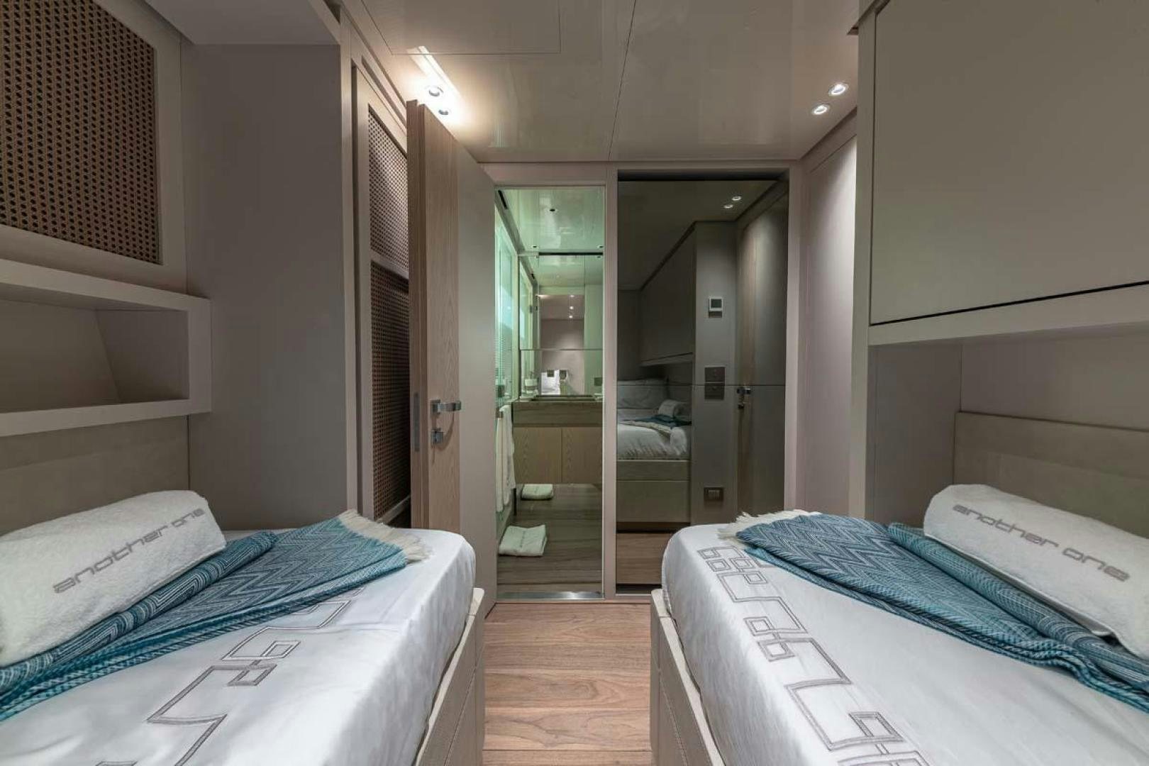 a room with a bed and a closet aboard ANOTHER ONE Yacht for Sale