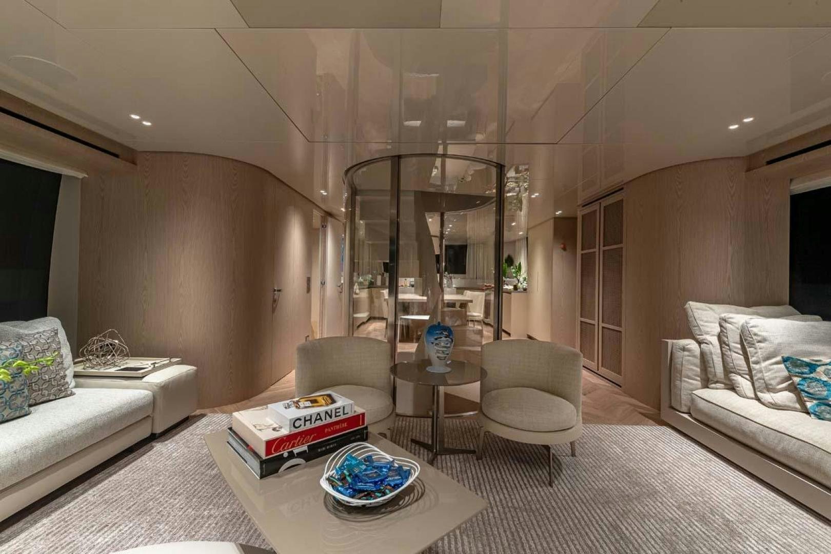 a living room with a glass door aboard ANOTHER ONE Yacht for Sale