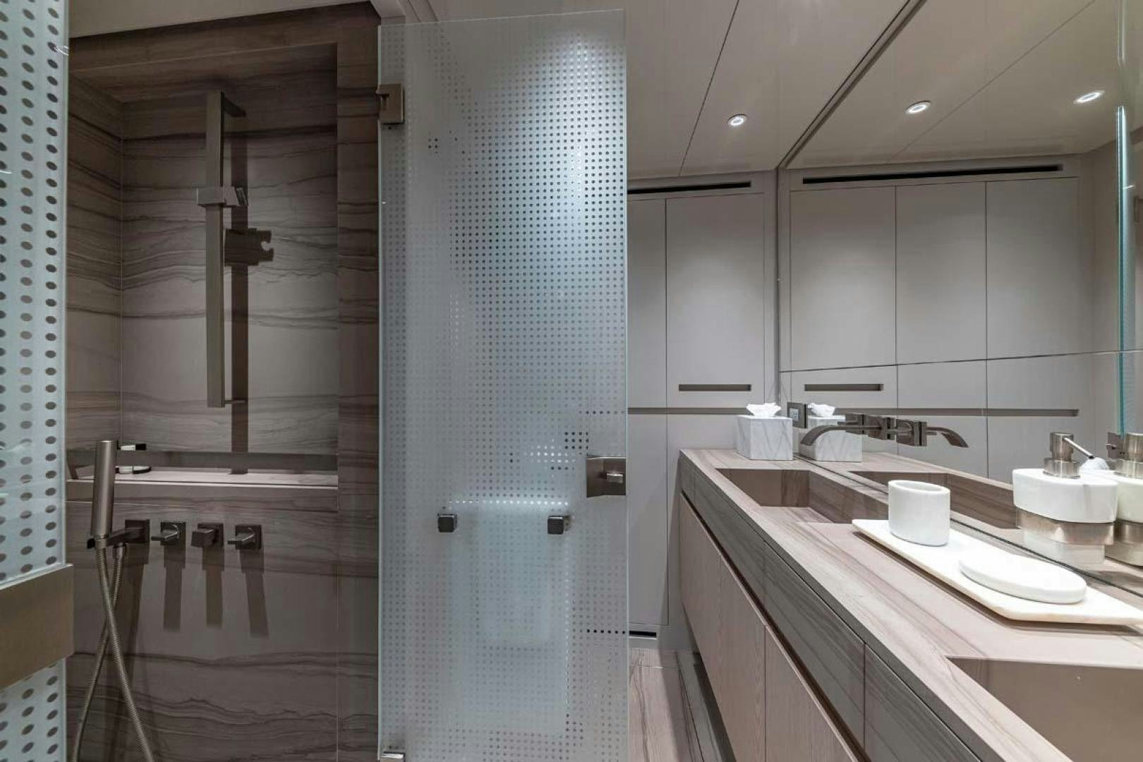 a bathroom with a shower and sink aboard ANOTHER ONE Yacht for Sale