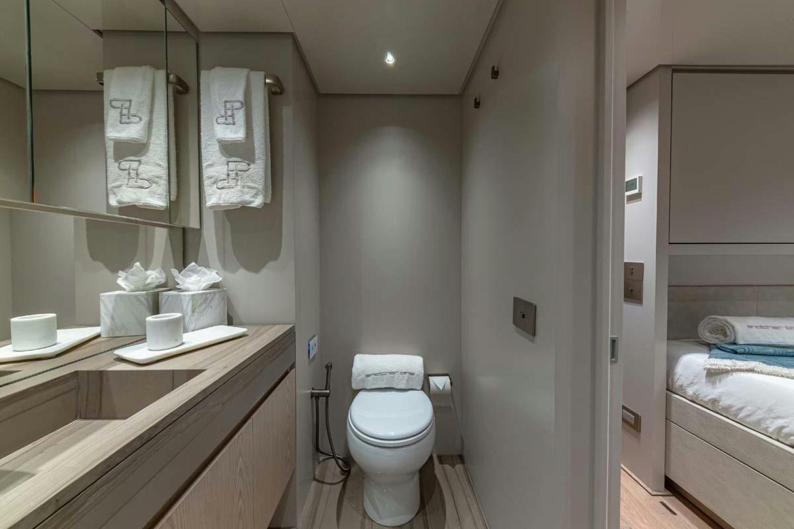 a bathroom with a toilet and a sink aboard ANOTHER ONE Yacht for Sale