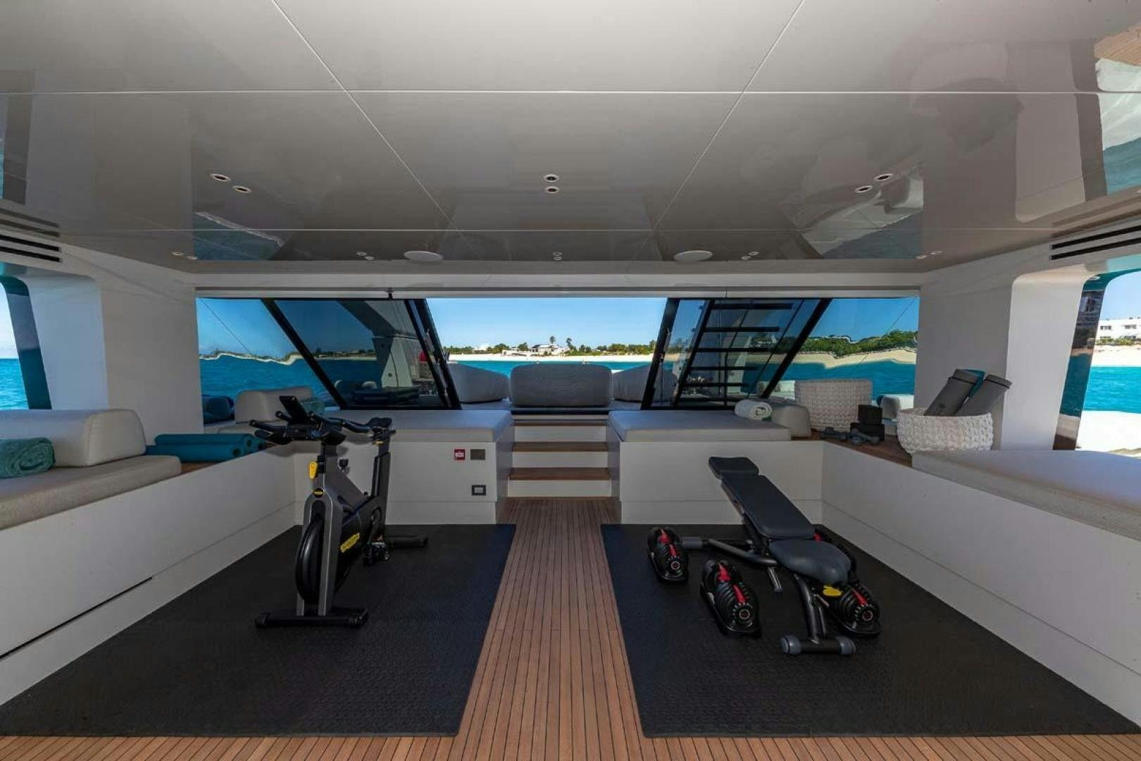 inside of a room with a large window and a view of the water aboard ANOTHER ONE Yacht for Sale