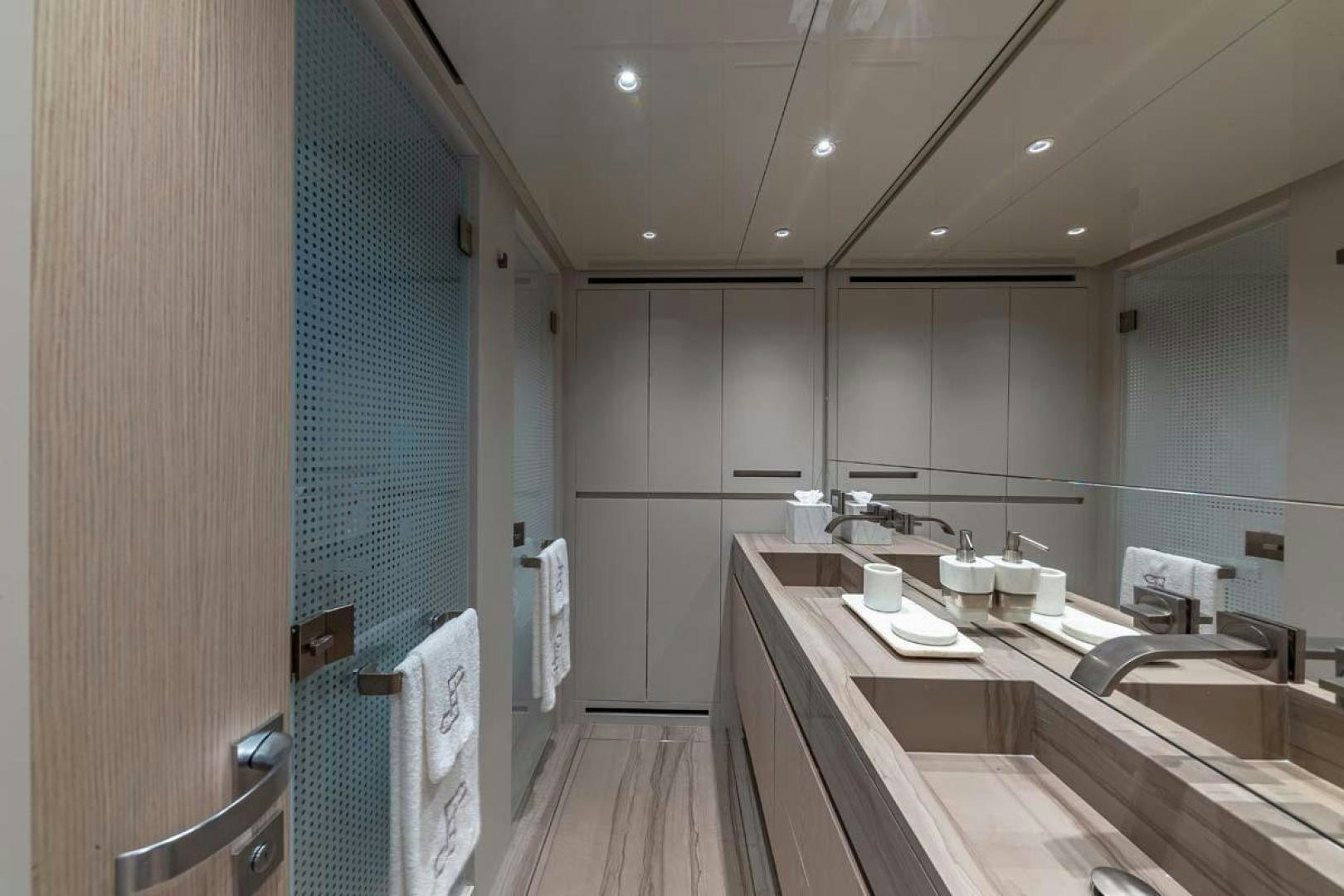a bathroom with a sink and a shower aboard ANOTHER ONE Yacht for Sale