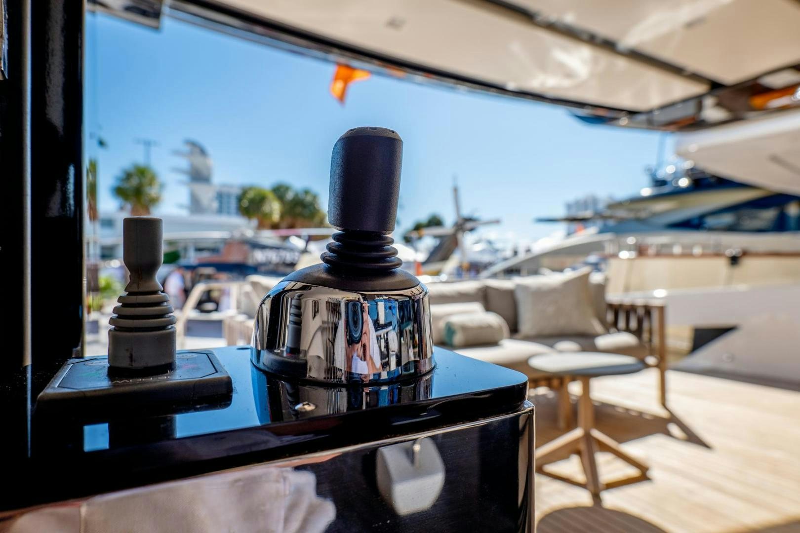 a glass bottle on a table aboard QUARANTENA Yacht for Sale