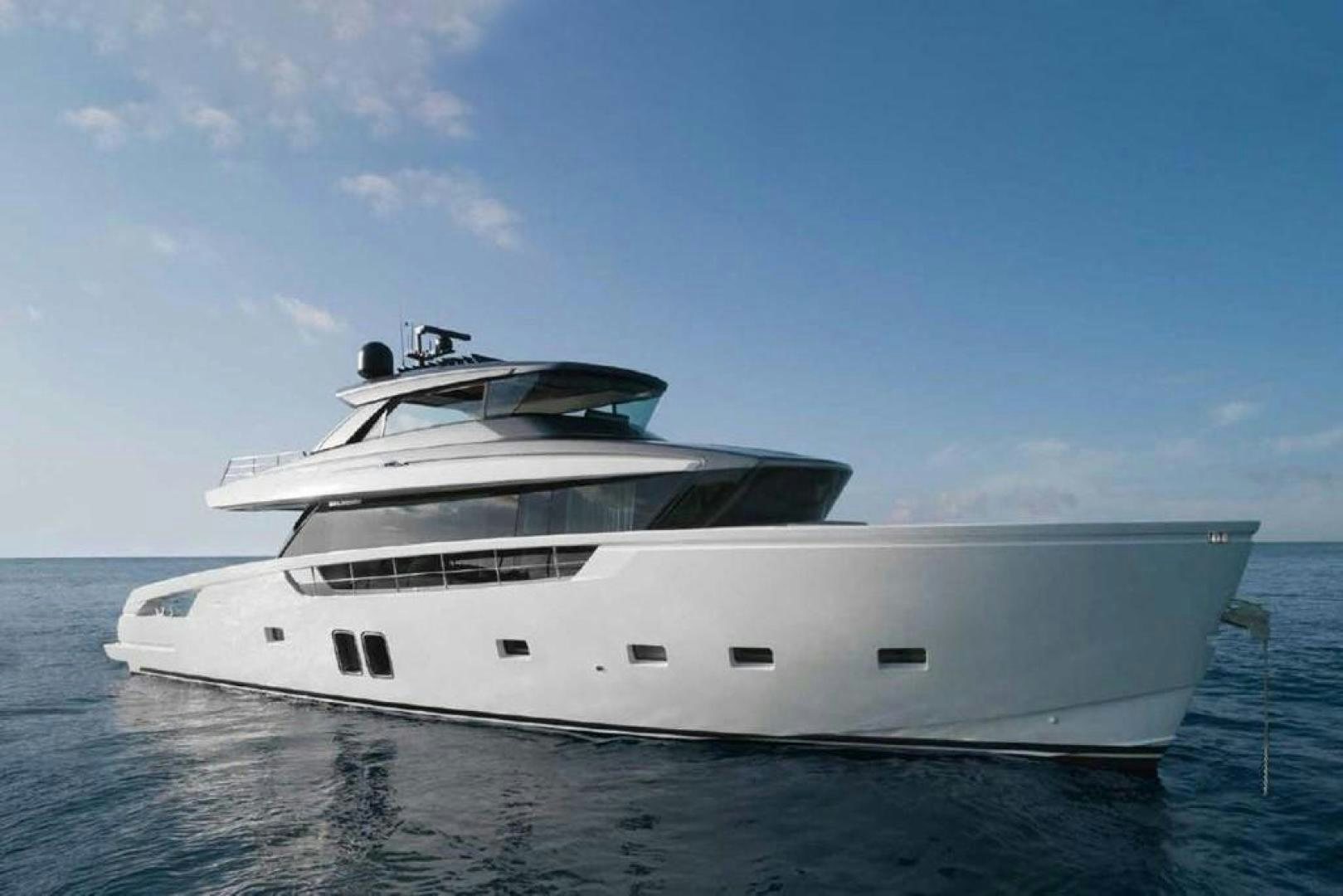 a white yacht on the water aboard QUARANTENA Yacht for Sale