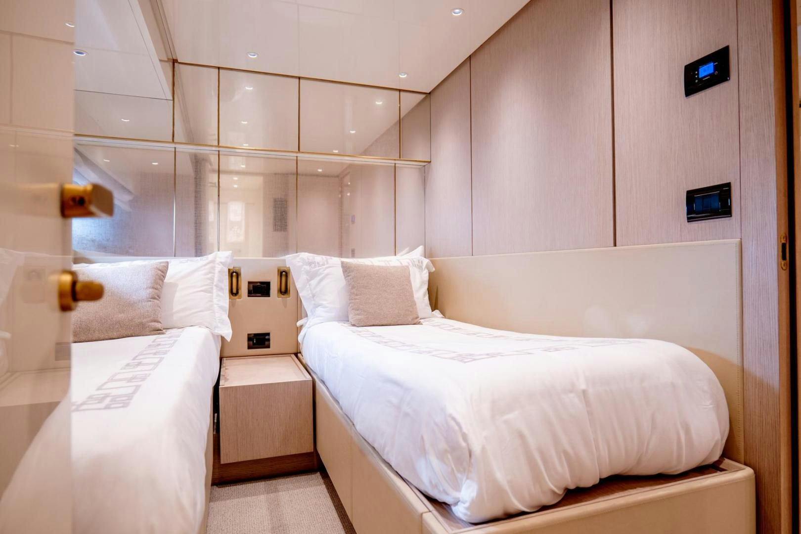 a room with two beds aboard QUARANTENA Yacht for Sale