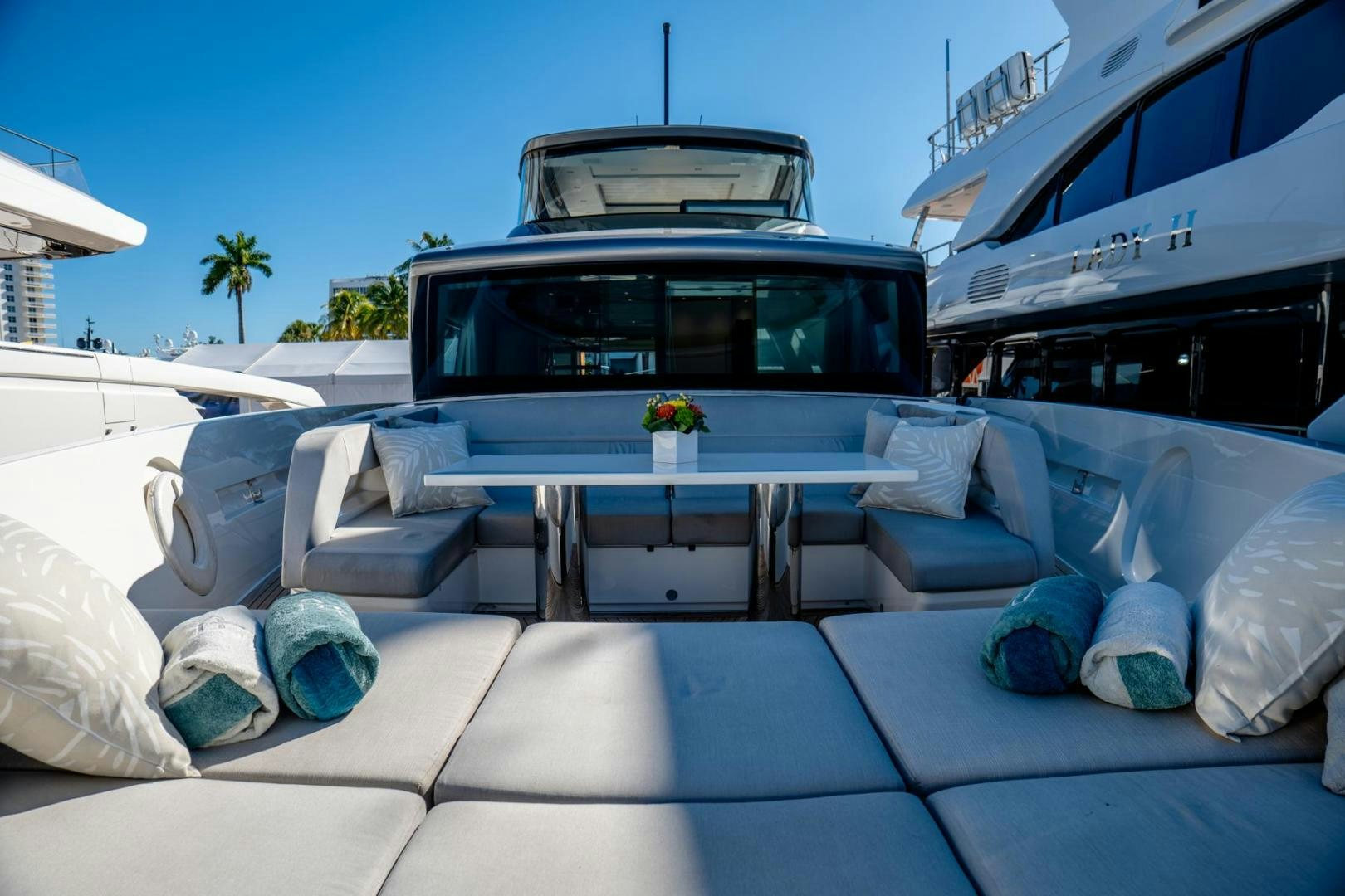 a group of chairs and a table outside aboard QUARANTENA Yacht for Sale