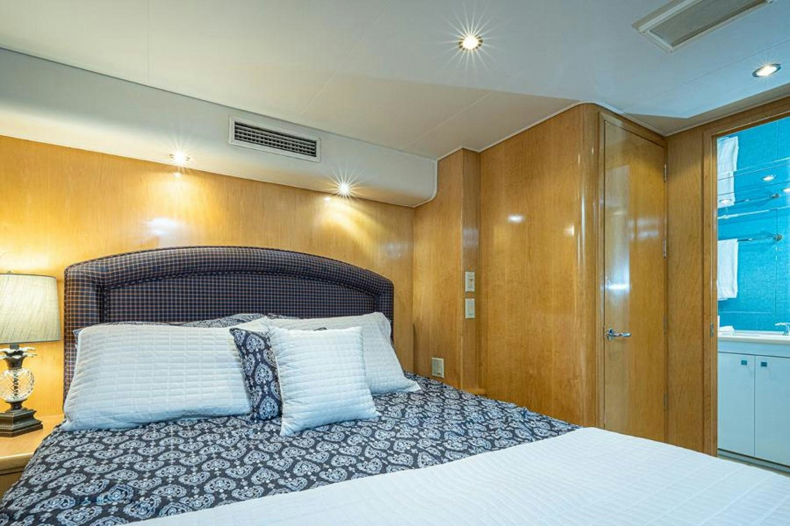a bed with pillows aboard TUFF LIFE IV Yacht for Sale